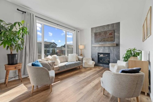 57 Ranchers Way, Okotoks, AB - Indoor Photo Showing Living Room With Fireplace