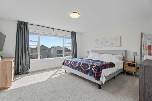 57 Ranchers Way, Okotoks, AB - Indoor Photo Showing Bedroom