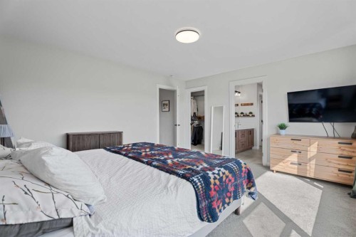 57 Ranchers Way, Okotoks, AB - Indoor Photo Showing Bedroom