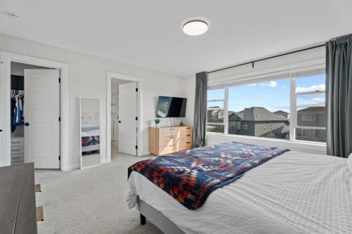 57 Ranchers Way, Okotoks, AB - Indoor Photo Showing Bedroom