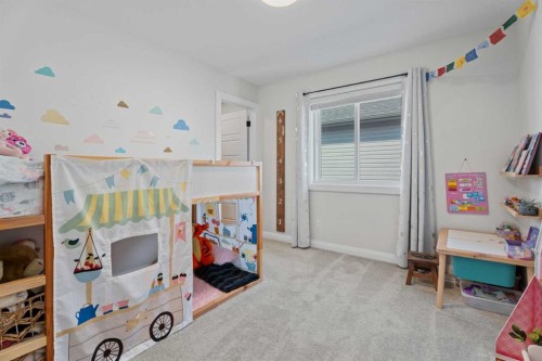 57 Ranchers Way, Okotoks, AB - Indoor Photo Showing Bedroom