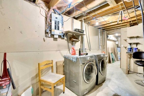 7915 Ranchview Drive Nw, Calgary, AB - Indoor Photo Showing Laundry Room