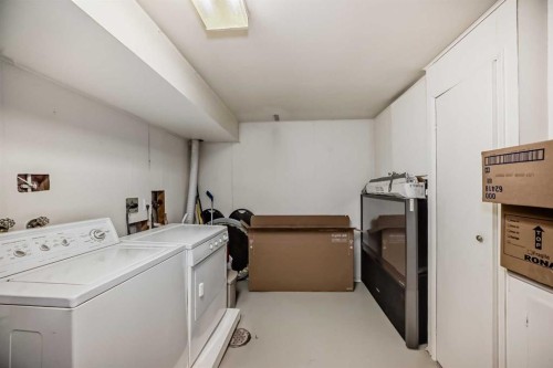 554 Whitehill Place Ne, Calgary, AB - Indoor Photo Showing Laundry Room