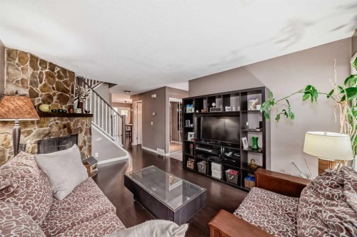 554 Whitehill Place Ne, Calgary, AB - Indoor With Fireplace