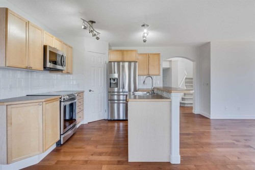 201 Crystalridge Rise, Okotoks, AB - Indoor Photo Showing Kitchen With Upgraded Kitchen
