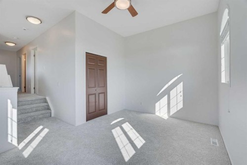 201 Crystalridge Rise, Okotoks, AB - Indoor Photo Showing Other Room