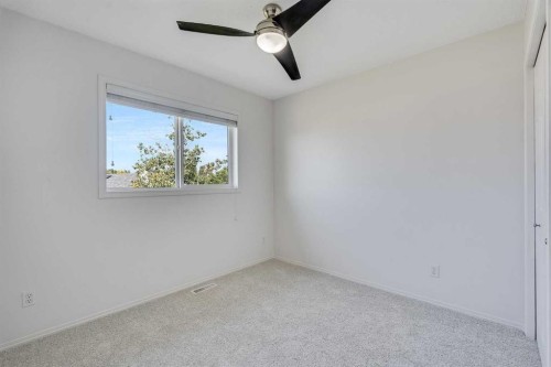 201 Crystalridge Rise, Okotoks, AB - Indoor Photo Showing Other Room