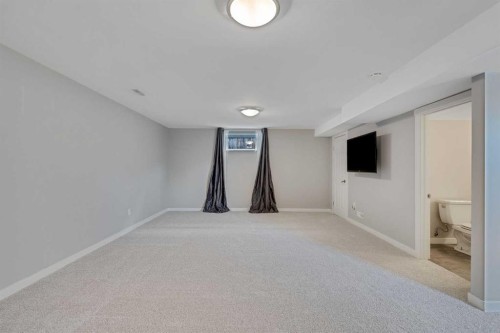 201 Crystalridge Rise, Okotoks, AB - Indoor Photo Showing Other Room