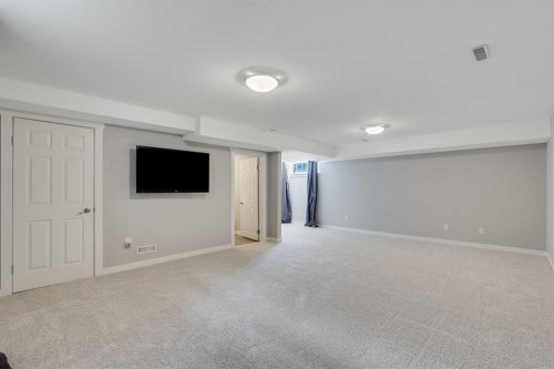 201 Crystalridge Rise, Okotoks, AB - Indoor Photo Showing Other Room