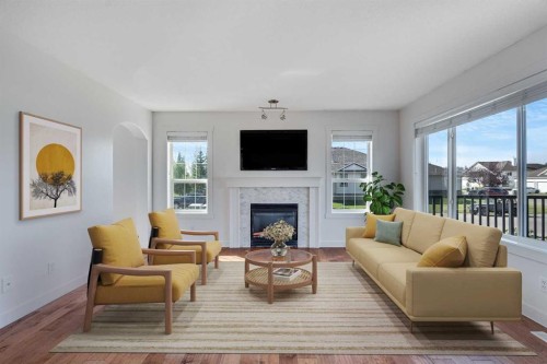 201 Crystalridge Rise, Okotoks, AB - Indoor Photo Showing Living Room With Fireplace