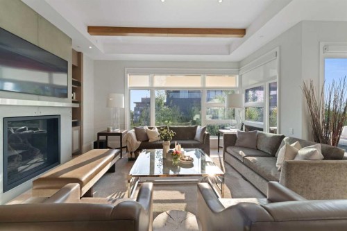 302-3030 17 Street Sw, Calgary, AB - Indoor Photo Showing Living Room With Fireplace