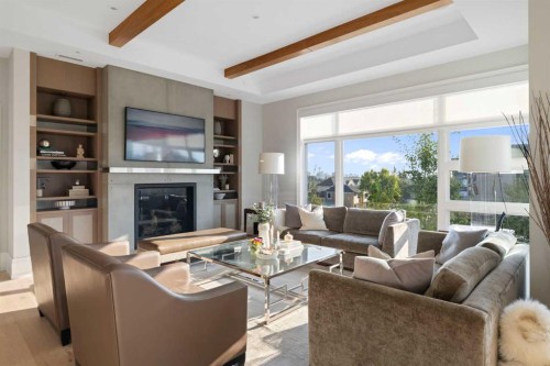 302-3030 17 Street Sw, Calgary, AB - Indoor Photo Showing Living Room With Fireplace
