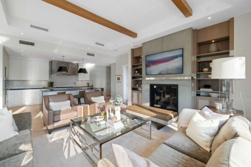 302-3030 17 Street Sw, Calgary, AB - Indoor Photo Showing Living Room With Fireplace