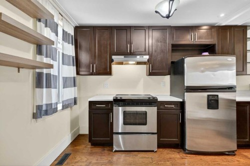 722 20 Avenue Nw, Calgary, AB - Indoor Photo Showing Kitchen With Stainless Steel Kitchen