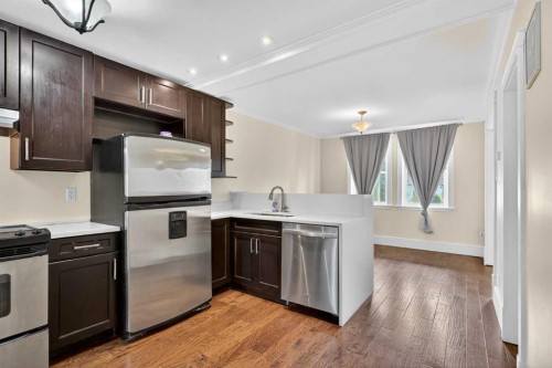 722 20 Avenue Nw, Calgary, AB - Indoor Photo Showing Kitchen With Stainless Steel Kitchen