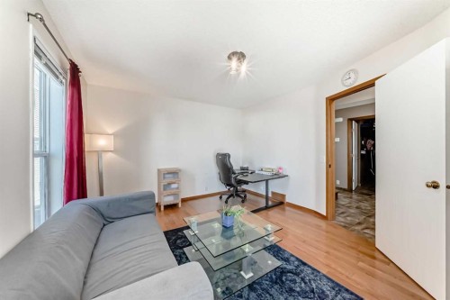 170 Shawbrooke Green Sw, Calgary, AB - Indoor Photo Showing Living Room