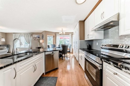 170 Shawbrooke Green Sw, Calgary, AB - Indoor Photo Showing Kitchen With Double Sink With Upgraded Kitchen