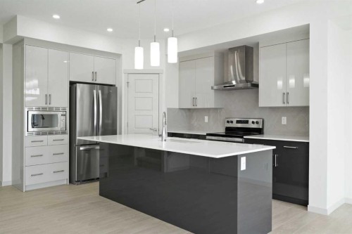 31 Lucas Passage Nw, Calgary, AB - Indoor Photo Showing Kitchen With Stainless Steel Kitchen With Upgraded Kitchen