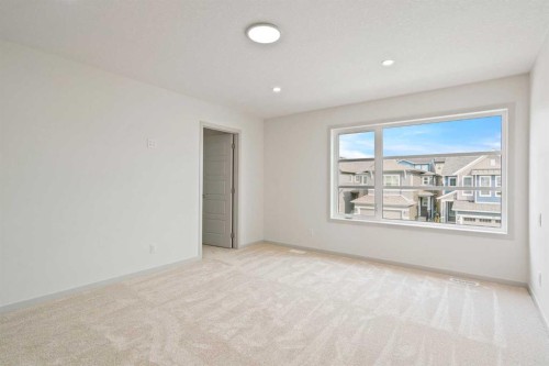 31 Lucas Passage Nw, Calgary, AB - Indoor Photo Showing Other Room