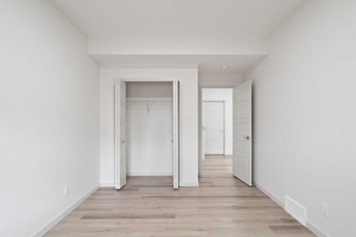 31 Lucas Passage Nw, Calgary, AB - Indoor Photo Showing Other Room