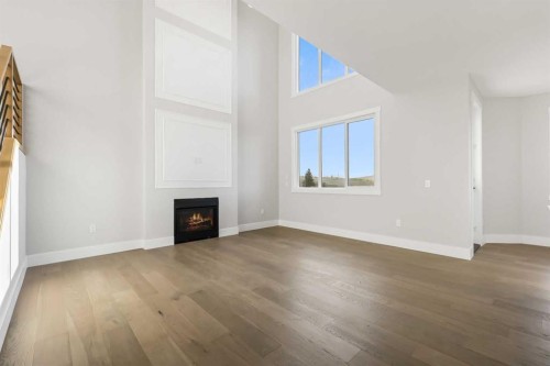 72 Heritage Ridge, Cochrane, AB - Indoor With Fireplace