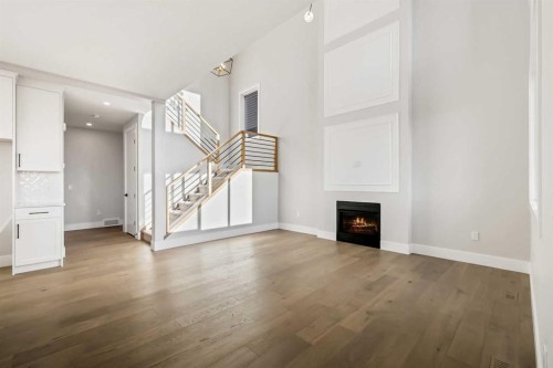 72 Heritage Ridge, Cochrane, AB - Indoor With Fireplace