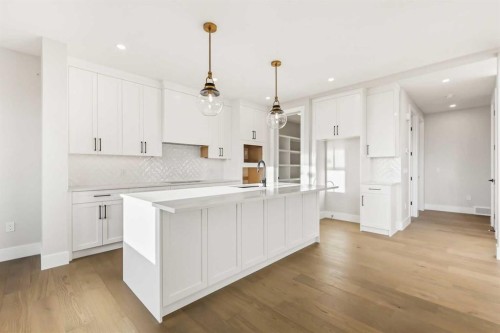 72 Heritage Ridge, Cochrane, AB - Indoor Photo Showing Kitchen With Upgraded Kitchen