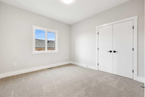 72 Heritage Ridge, Cochrane, AB - Indoor Photo Showing Other Room