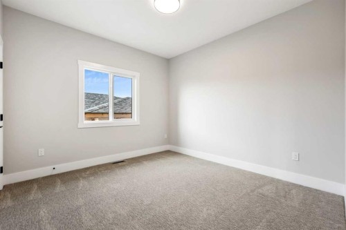 72 Heritage Ridge, Cochrane, AB - Indoor Photo Showing Other Room