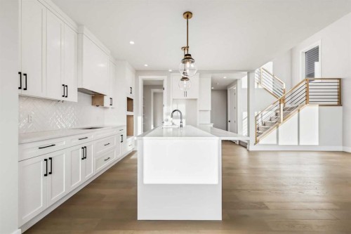 72 Heritage Ridge, Cochrane, AB - Indoor Photo Showing Kitchen With Upgraded Kitchen