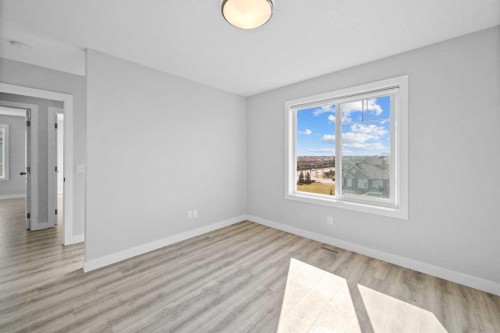 384 Canals Crossing Sw, Airdrie, AB - Indoor Photo Showing Other Room