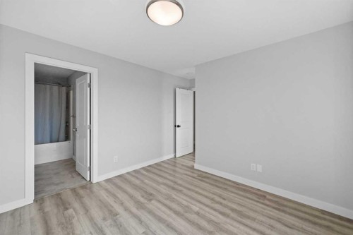 384 Canals Crossing Sw, Airdrie, AB - Indoor Photo Showing Other Room