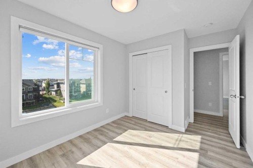 384 Canals Crossing Sw, Airdrie, AB - Indoor Photo Showing Other Room