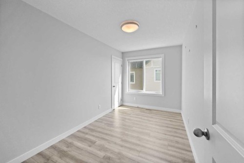 384 Canals Crossing Sw, Airdrie, AB - Indoor Photo Showing Other Room