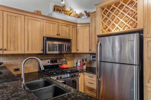 1103-70 Dyrgas Gate, Canmore, AB - Indoor Photo Showing Kitchen With Double Sink With Upgraded Kitchen