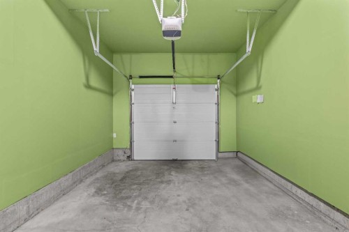 1103-70 Dyrgas Gate, Canmore, AB - Indoor Photo Showing Garage