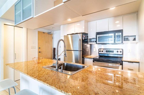1301-1110 11 Street Sw, Calgary, AB - Indoor Photo Showing Kitchen With Stainless Steel Kitchen With Double Sink With Upgraded Kitchen