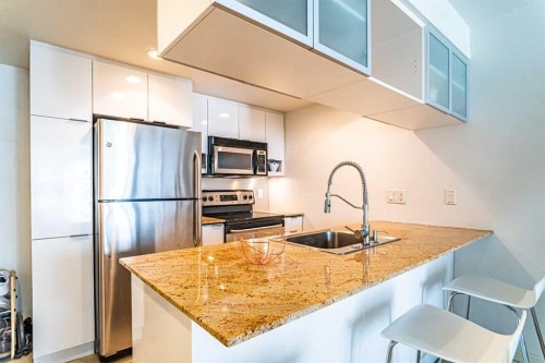 1301-1110 11 Street Sw, Calgary, AB - Indoor Photo Showing Kitchen With Stainless Steel Kitchen With Upgraded Kitchen