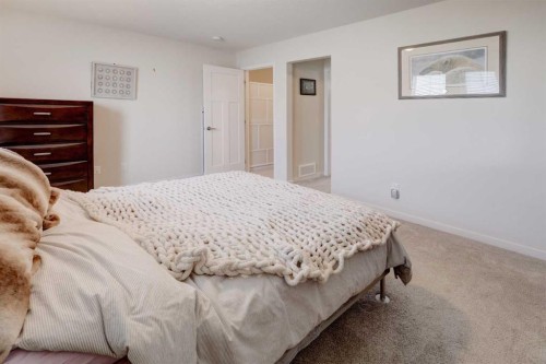 113 South Point Court Sw, Airdrie, AB - Indoor Photo Showing Bedroom