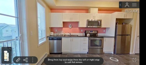 2305-215 Legacy Boulevard Se, Calgary, AB - Indoor Photo Showing Kitchen With Stainless Steel Kitchen