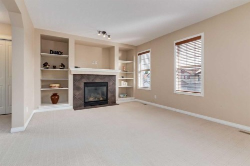 82 Everglen Crescent Sw, Calgary, AB - Indoor Photo Showing Other Room With Fireplace
