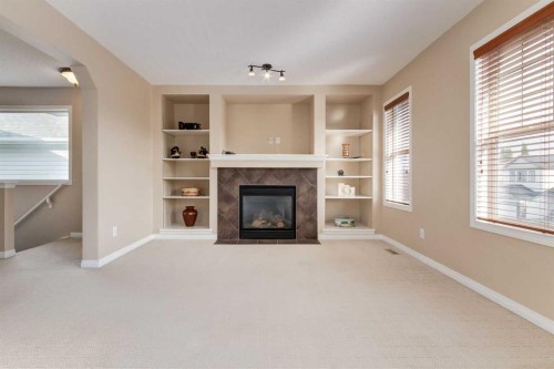 82 Everglen Crescent Sw, Calgary, AB - Indoor With Fireplace