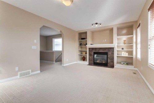 82 Everglen Crescent Sw, Calgary, AB - Indoor With Fireplace