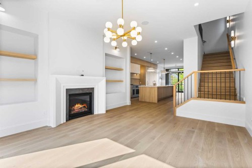 2009 28 Avenue Sw, Calgary, AB - Indoor Photo Showing Other Room With Fireplace