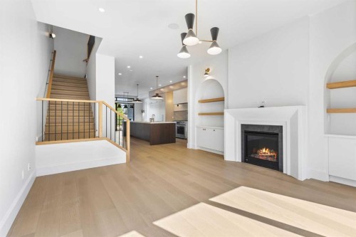 2011 28 Avenue Sw, Calgary, AB - Indoor Photo Showing Living Room With Fireplace
