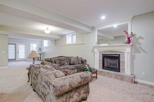 47 Rockywood Circle Nw, Calgary, AB - Indoor With Fireplace