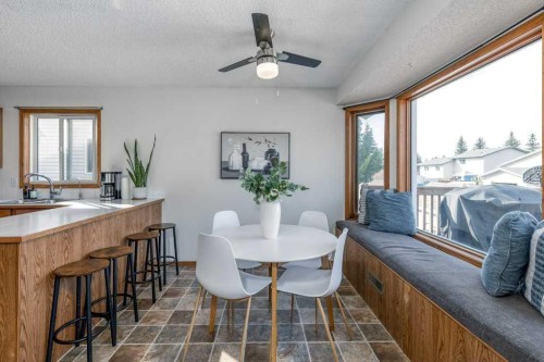 21 West Mcdougal Road, Cochrane, AB - Indoor Photo Showing Dining Room