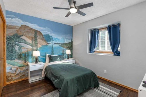 21 West Mcdougal Road, Cochrane, AB - Indoor Photo Showing Bedroom