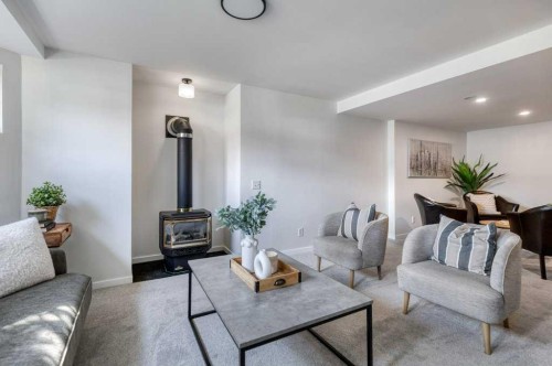 21 West Mcdougal Road, Cochrane, AB - Indoor Photo Showing Living Room