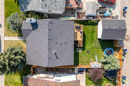 21 West Mcdougal Road, Cochrane, AB - Outdoor With Deck Patio Veranda